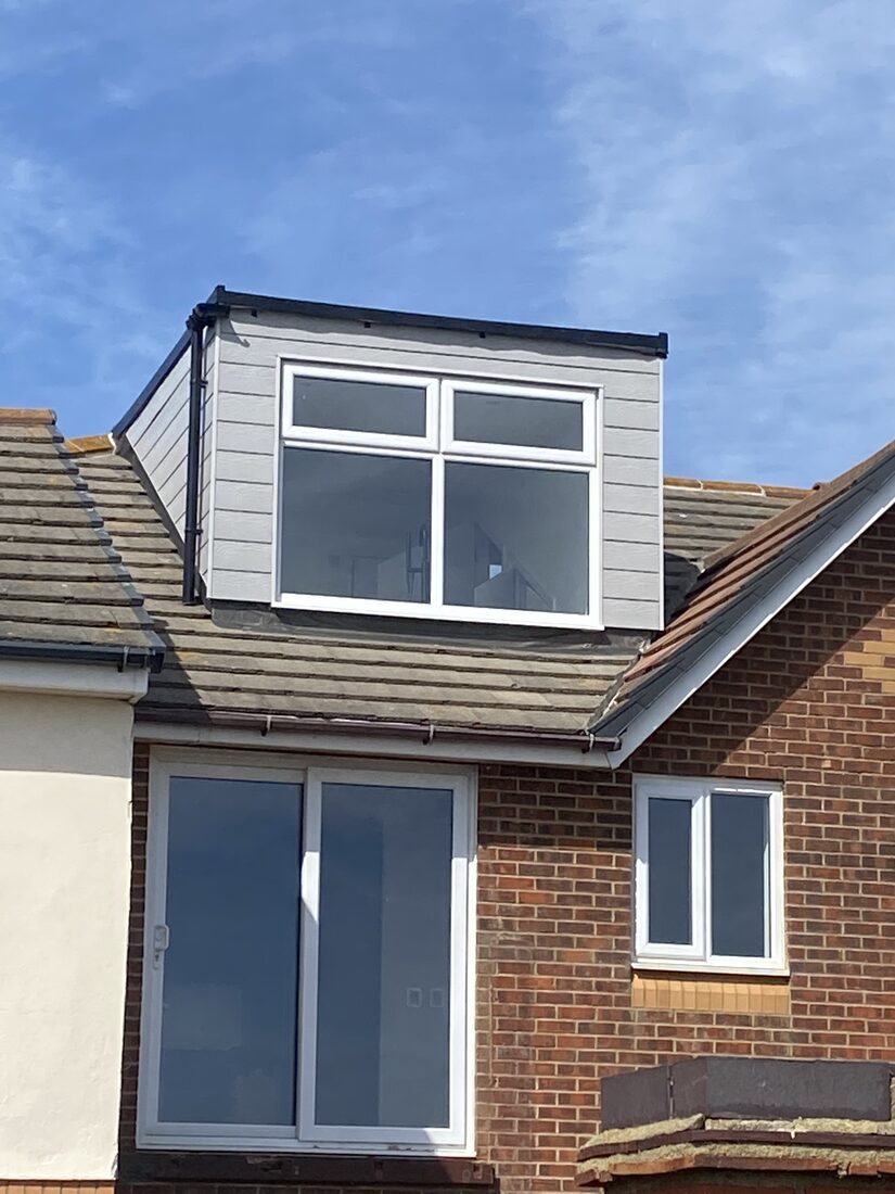 House with dormer loft extension